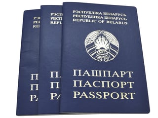 Three Belarus passports stacked together