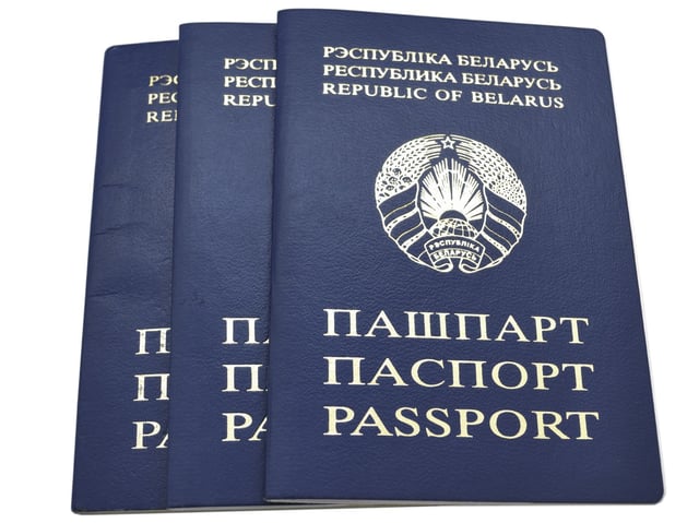 Three Belarus passports stacked together