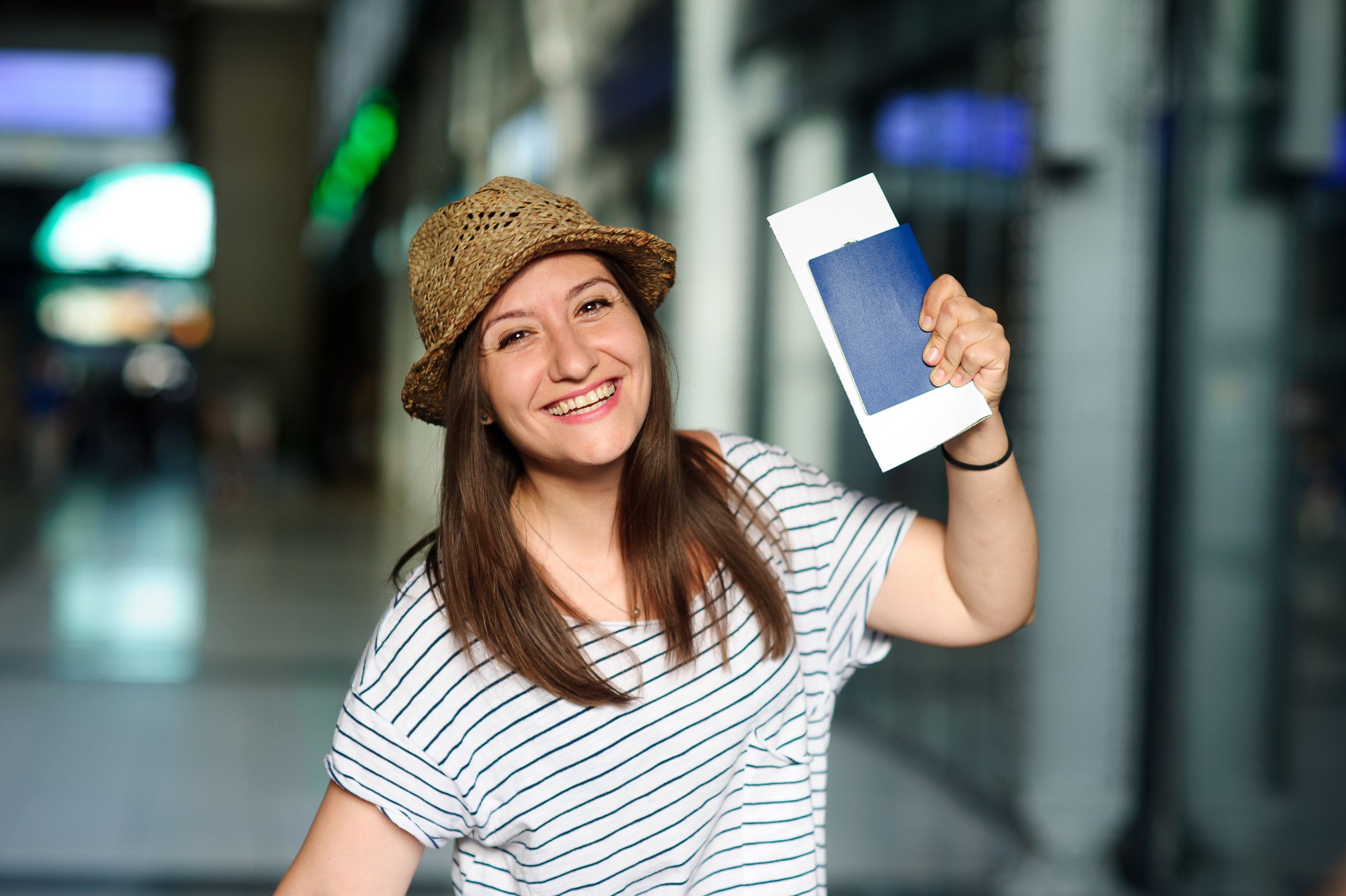 Cheerful Tourist With The Passport And Tickets Summer Holiday